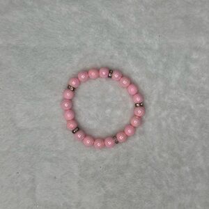 Handmade Ladies pink pearl bracelet withh rhinestone spacers.